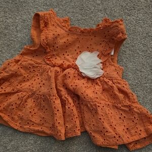 Orange Eyelet Baby Dress with White Flower